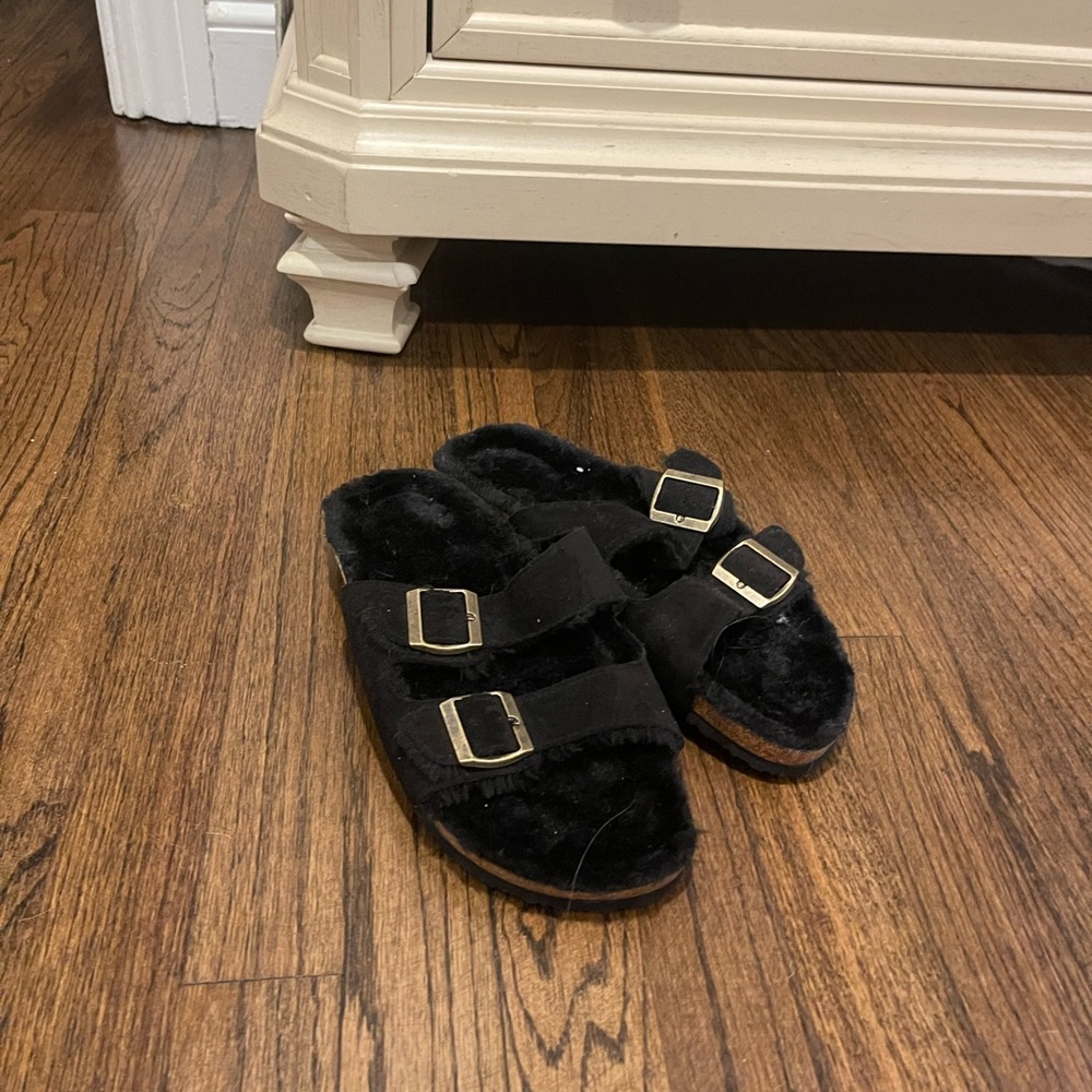 Brand: Birkenstocks. Color: Black.